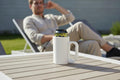 3D-printed insulated can cooler with handle in white holding a 500ml beverage can, HappyLayerMint Malta