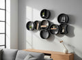 Modular round 3D-printed wall shelf in sage green showing display items, HappyLayerMint Malta